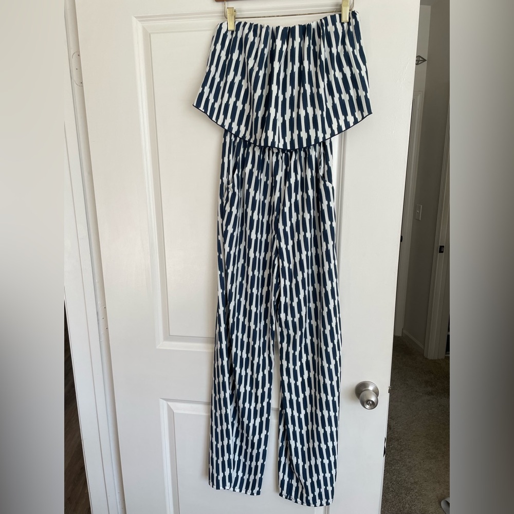Tyche Strapless Jumpsuit with pockets. Size small. Blue and white.
